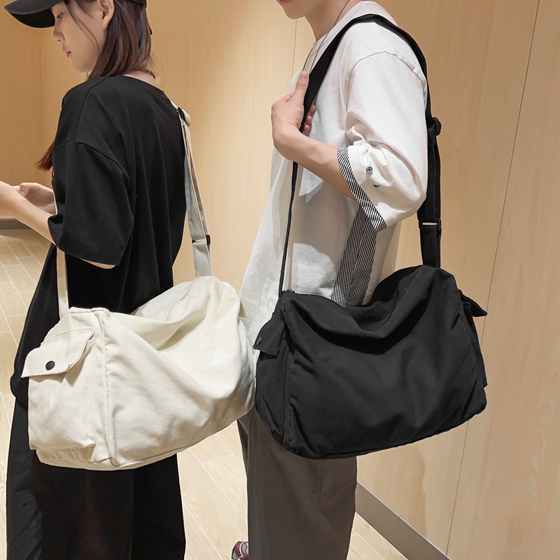 Canvas bag, women's large-capacity retro casual messenger bag, college student class bag, solid-color simple travel single-shoulder bag details Picture