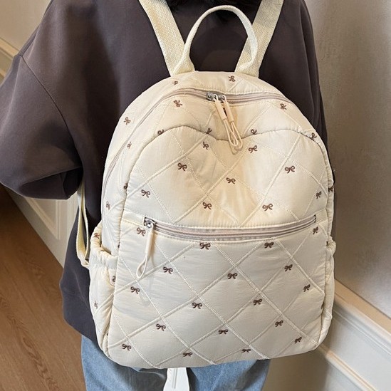 Cotton-padded jacket backpack for women, 2025 New trendy Korean style bow embroidery schoolbag, large-capacity casual and lightweight backpack full figure