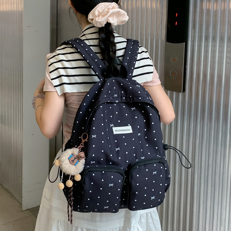 A new style of forest-themed backpack for college students, a sweet and cute polka dot backpack with large pockets and versatile versatility Specification drawing