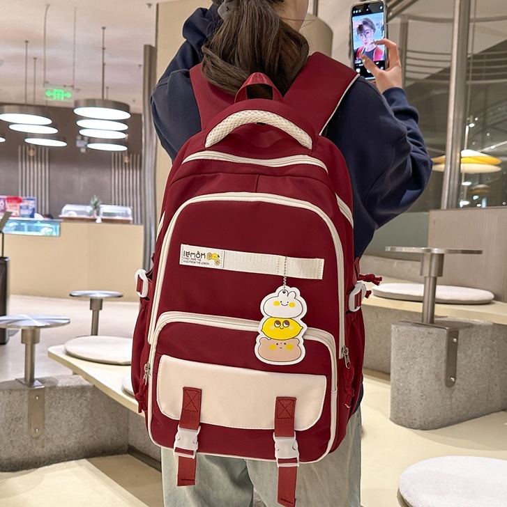Korean-style schoolbag for female junior high school students, large-capacity wide shoulder strap to reduce burden, campus backpack for female senior high school students, lightweight backpack full figure