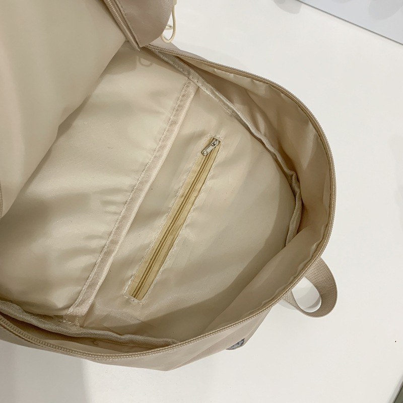 Simple and trendy ins brand versatile schoolbag, girls' design sense, niche high school student backpack, junior high school student Korean-style backpack Application Scenario