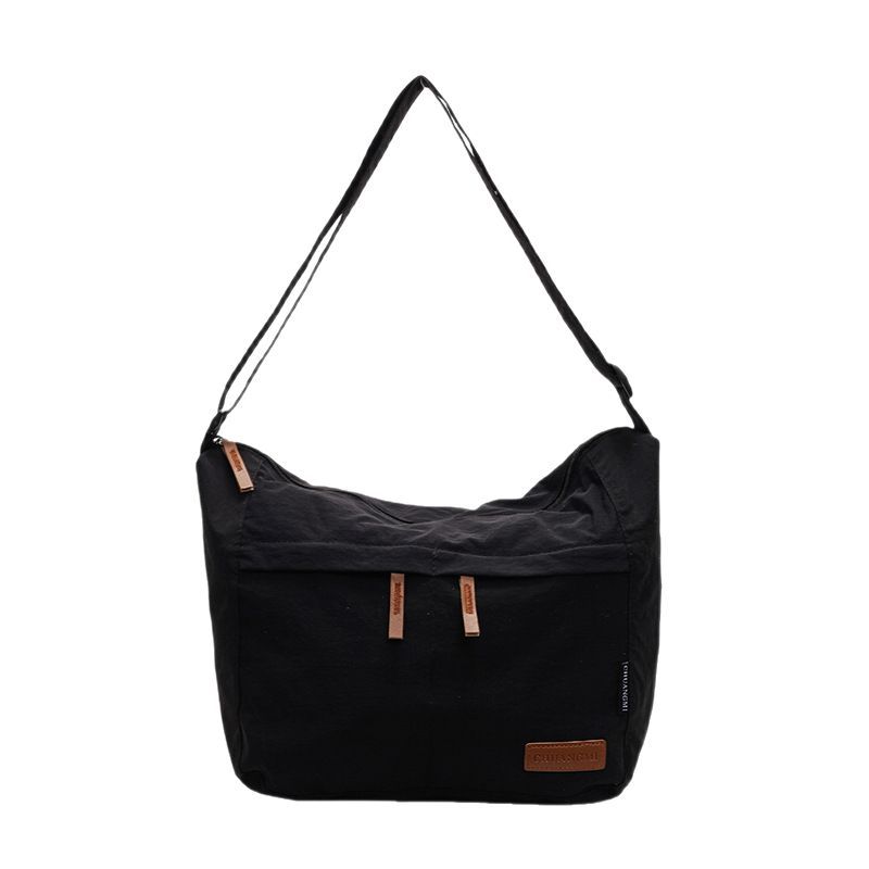 Japanese-style casual and laid-back student commuting tote bag, large capacity, simple solid color, light and versatile crossbody bag for girls Item Picture