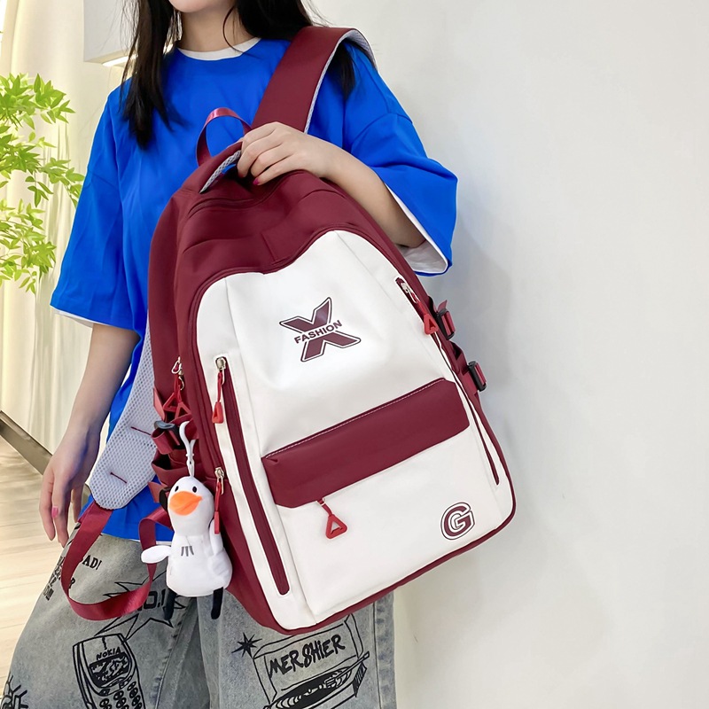 Wholesale of new large-capacity junior high school and senior high school schoolbags, female college student computer backpacks, simple and dirt-resistant casual backpacks Specification drawing