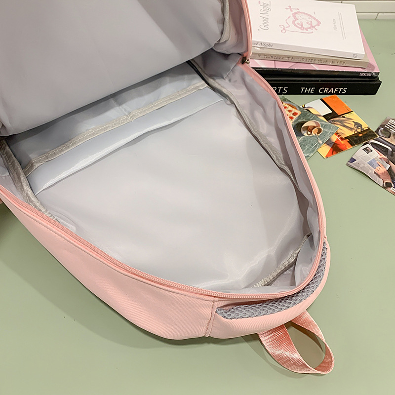 The new schoolbag features a high level of appearance, a college-style high school backpack, and a Korean-style Instagram sweet girl two-piece backpack for primary school students Application Scenario