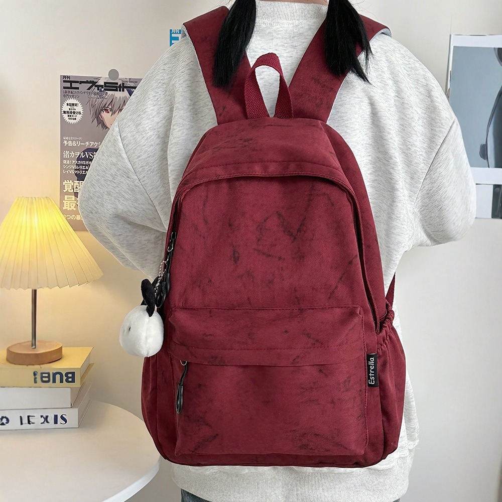 This is a simple and versatile large-capacity tie-dyed backpack for a girl's university birthday. It is a new travel backpack for 2025 full figure