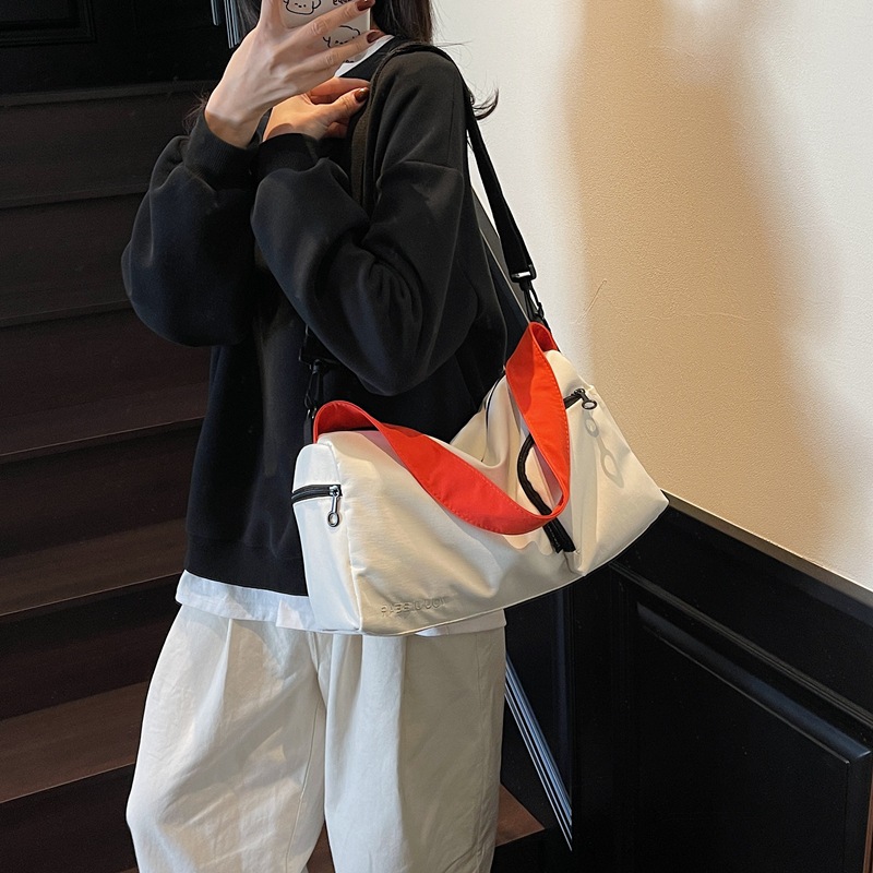 2025 New women's trendy, fashionable, versatile commuter crossbody bag, casual single-shoulder bag, fabric bag, large-capacity casual bag details Picture