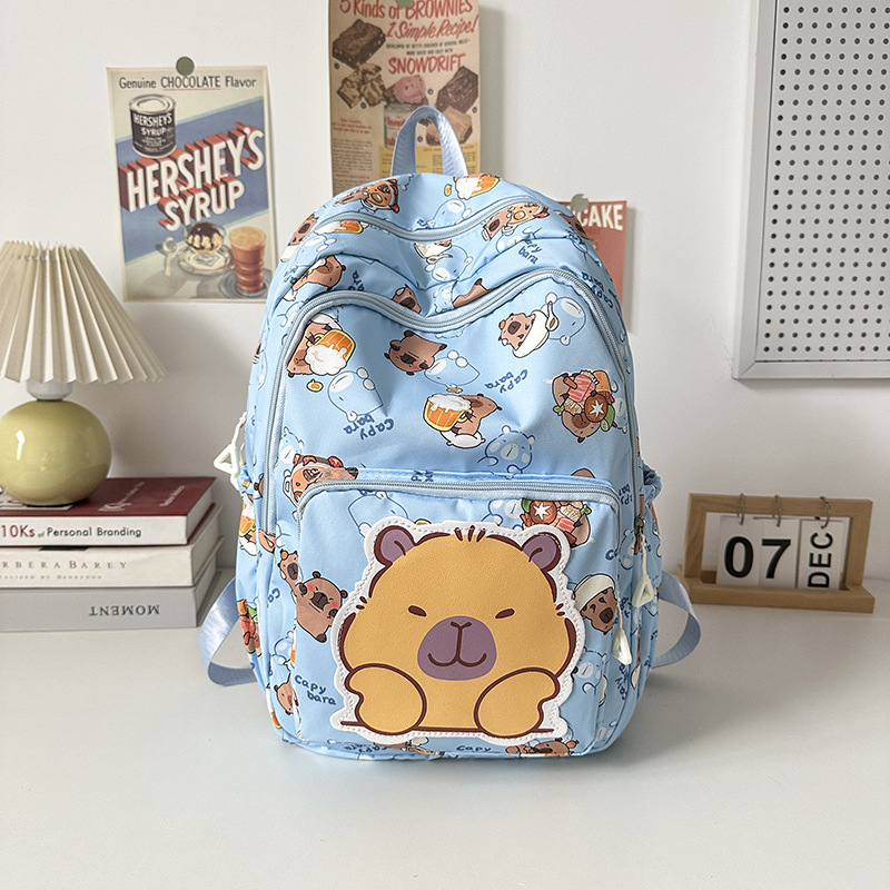 The 2025 new Capibarra cute printed cartoon schoolbag is a fashionable lightweight backpack for boys, girls and students details Picture