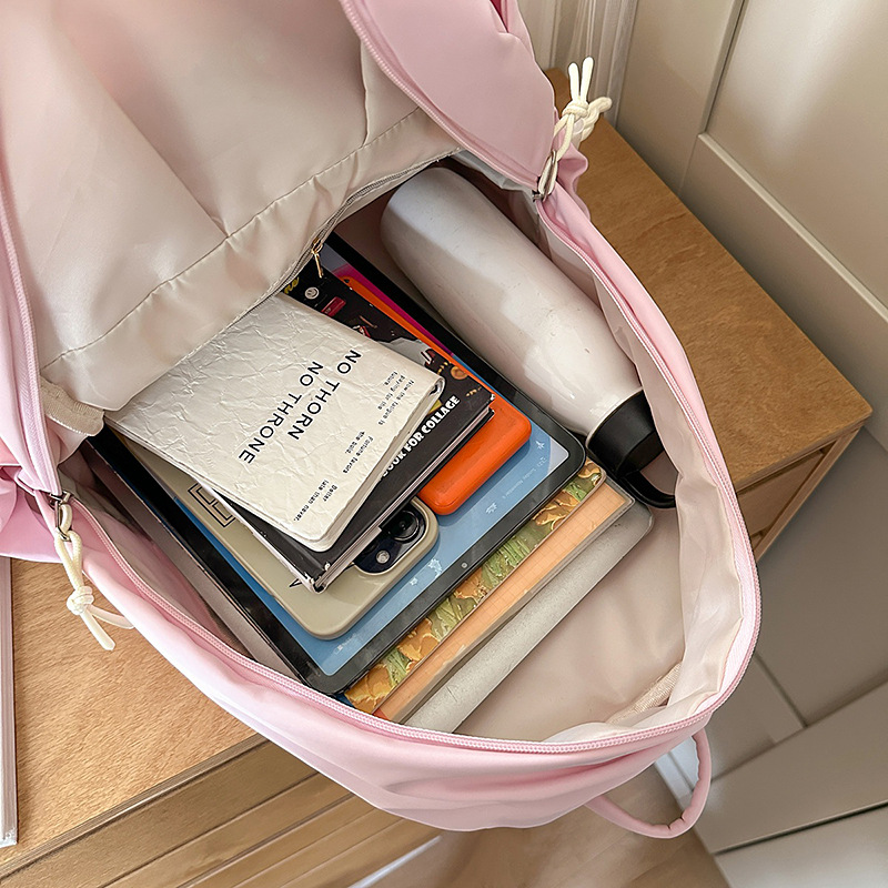 A new high-appearance-level, fresh, sweet and cute candy-colored backpack for junior and senior high school students in the Korean version of Instagram Application Scenario