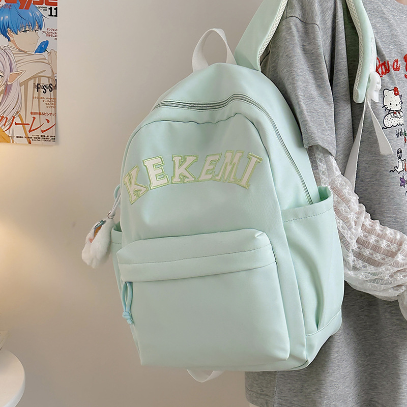 The new summer schoolbags for primary and secondary school students are in the style of Korean Harajuku, a fresh and light backpack, and a forest-style travel backpack for college students details Picture