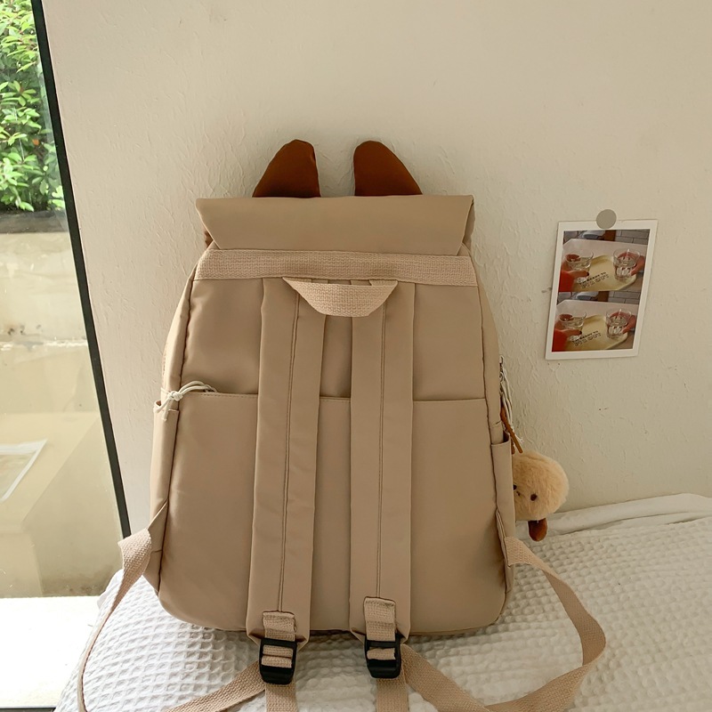 The new Korean version schoolbag is lightweight and has a large capacity. It is a backpack for students in grades three to six and an ugly and cute cat backpack Specification drawing