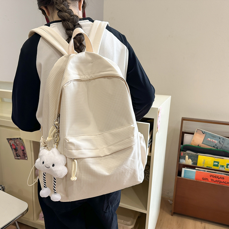College student schoolbags, simple, lightweight and versatile checkered backpacks for female junior high school students, high school student class bags, travel backpacks details Picture