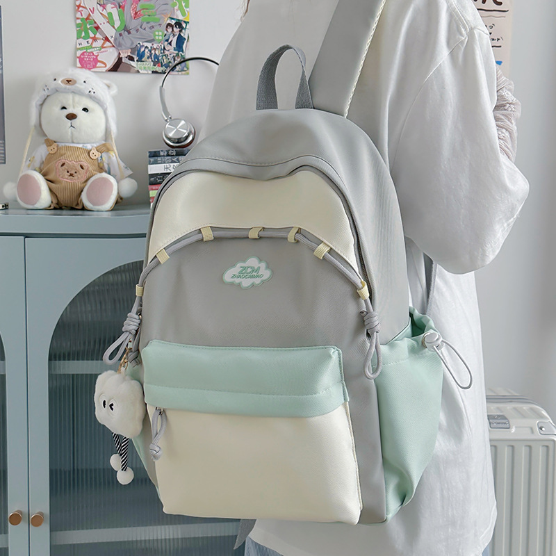 A new high-appearance-level Japanese ins fresh and sweet candy-colored backpack, a lightweight mini backpack for junior and senior high school students details Picture