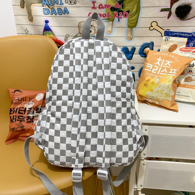 The 2025 new trendy schoolbag for girls in grades 1-6 features a large-capacity checkerboard pattern backpack and a fashionable color-blocking couple backpack Specification drawing