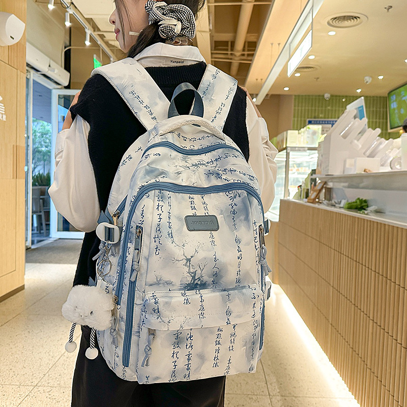 Korean-style fashionable backpack, high appearance level, niche, simple and versatile, large-capacity schoolbag, backpack for middle and high school students on the shoulder details Picture