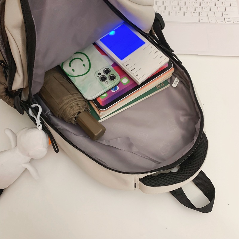 A Japanese, ins workwear style college student sports backpack with a large capacity and sturdy middle school student backpack Application Scenario