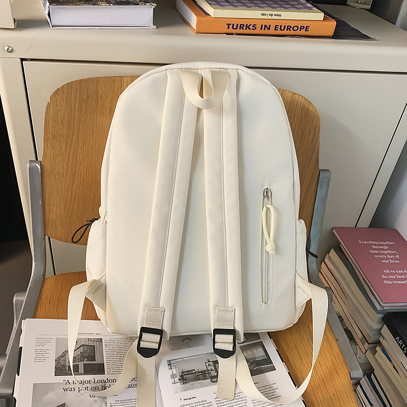A new high-look, solid-color, simple backpack from the Korean version of Instagram. It's a casual, lightweight, versatile and large-capacity backpack for couples Specification drawing