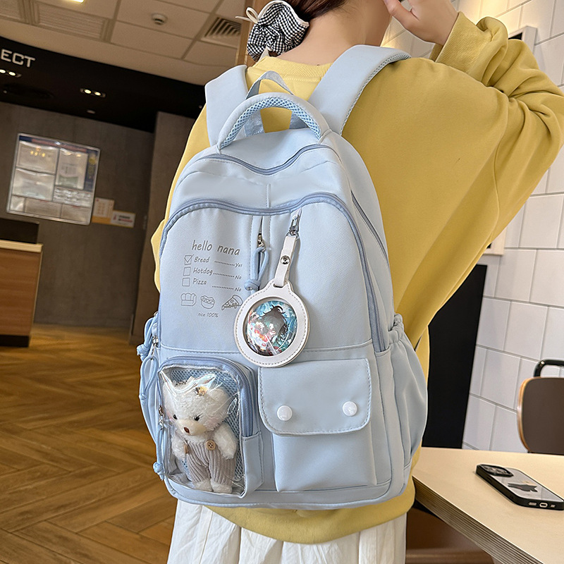 A new, fashionable, simple and large-capacity backpack with a cute Japanese school style. It's a sweet and versatile high school backpack details Picture