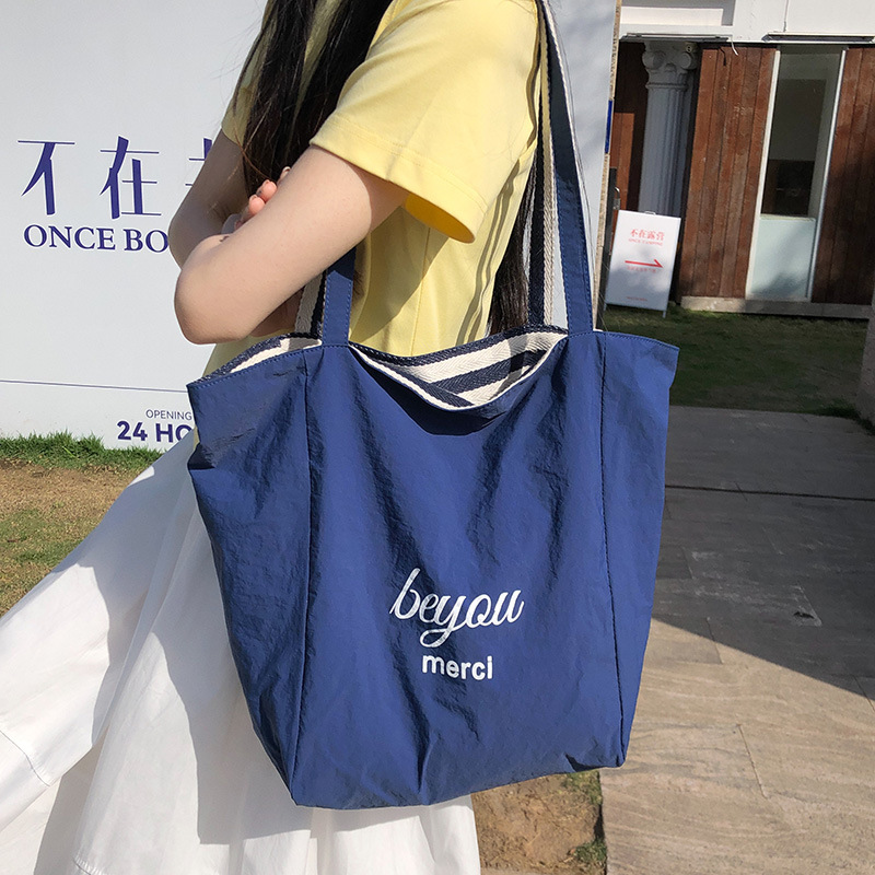 Korean-style Instagram niche and laid-back striped large bag, student commuting single-shoulder bag, double-sided crossbody bag, casual backpack details Picture