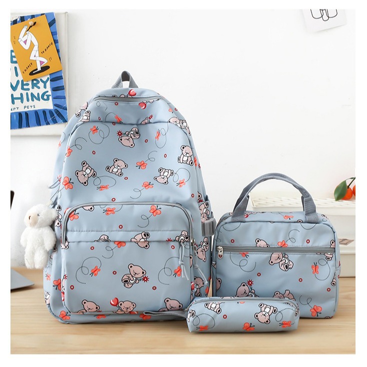 Student cartoon backpack for girls, Korean version, versatile, primary school campus backpack, lightweight nylon three-piece schoolbag Application Scenario