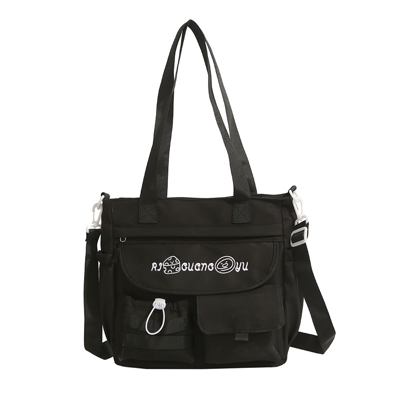 A new Japanese-style schoolgirl handbag with a fresh, sweet and cute look. It's a color-matched crossbody bag for college students going out for shopping Item Picture