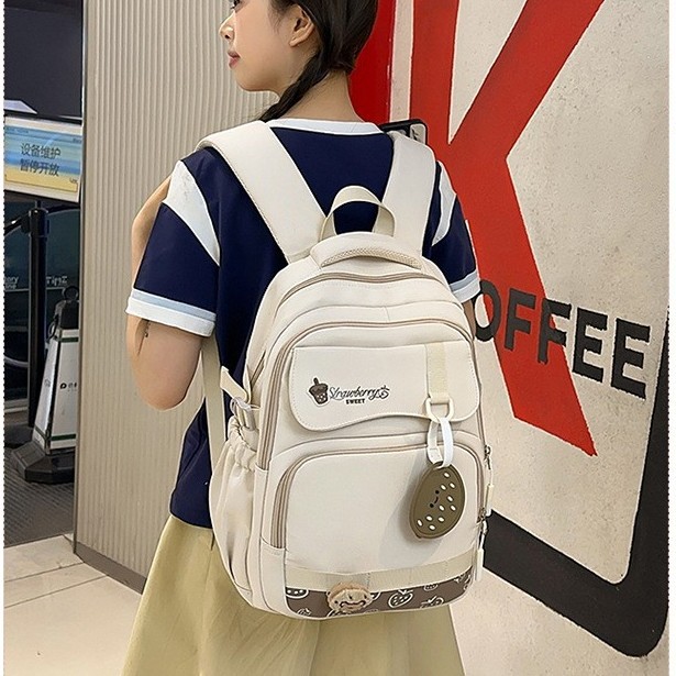 The new summer milk tea college style schoolbag has a high appearance level and contrasting colors. It is a multi-layered backpack for primary and secondary school students in grades three and six details Picture