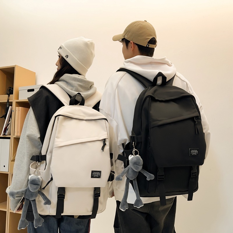 A Korean-style trendy college student couple casual backpack with a simple and casual large-capacity middle school student backpack details Picture