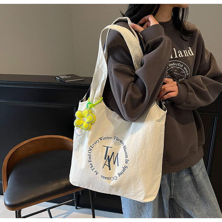 Simple and versatile large-capacity tote bag, Korean-style casual commuting simple single-shoulder bag, artistic and laid-back underarm crossbody bag details Picture