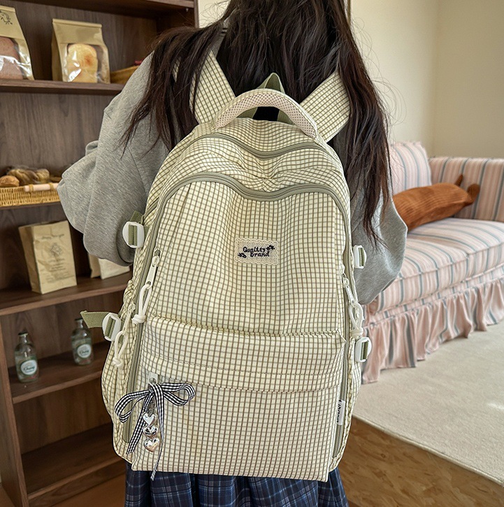 High-appearance-level checkered schoolbag for female college students, casual backpack for junior high school students, large-capacity versatile backpack for senior high school students, trendy full figure