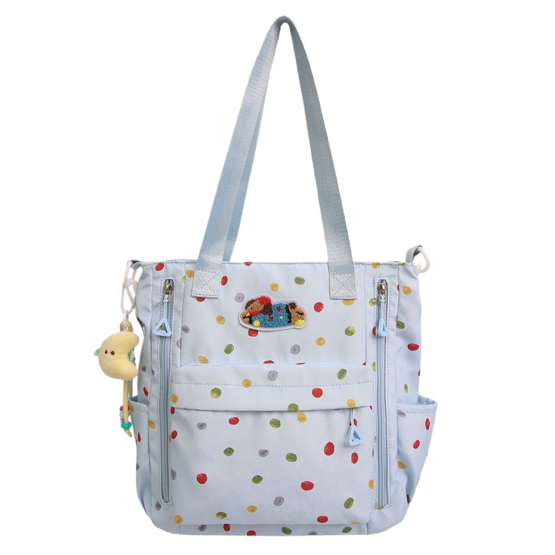 A new high-appeal, fresh and cute printed backpack for students, a casual, simple, lightweight and versatile large-capacity crossbody bag Item Picture