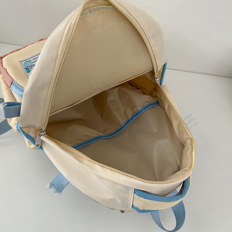 2025 New school style cute and niche design schoolbag, Japanese color contrast dopamine backpack, fresh and clean backpack Application Scenario