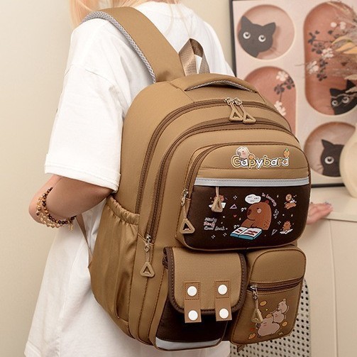 A new, sweet and cute Capibara backpack with a high appearance level, a lightweight and large-capacity shoulder bag for children in grades 3 to 6 details Picture