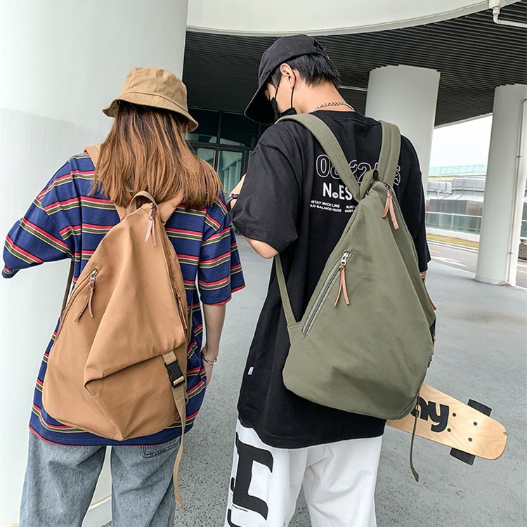 Men's washed canvas backpack, Japanese and Korean niche backpack, solid color, retro, high-end, high couple style folding backpack full figure