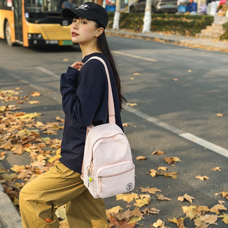 A new spring casual and sporty single-shoulder crossbody bag in a solid color from Japanese ins Muji details Picture