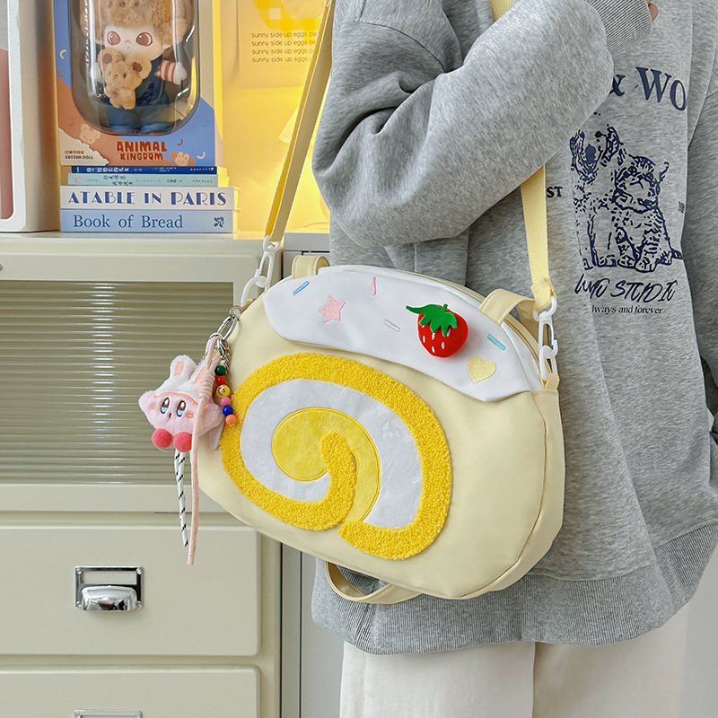 Cute color-blocking Swiss roll crossbody bag for girls 2025 new style sweet girl college student class shoulder bag tote bag details Picture