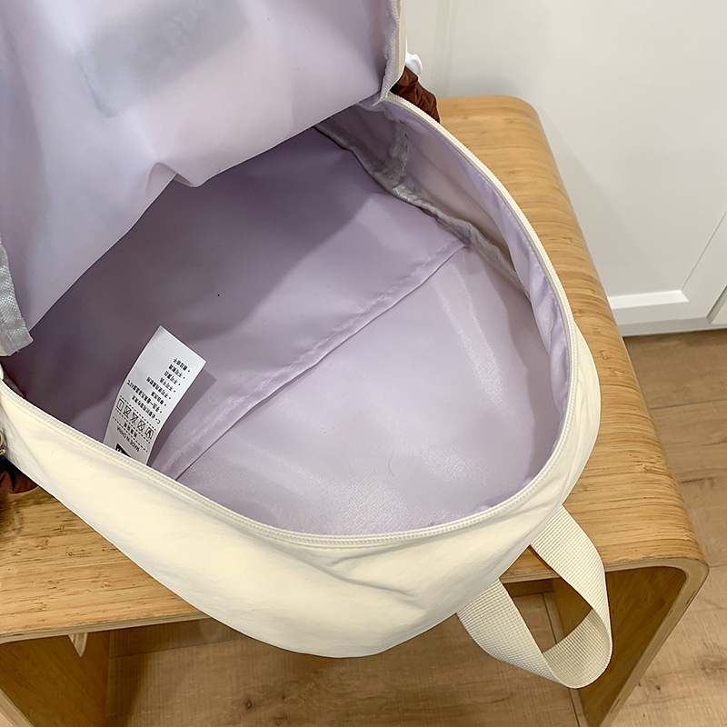 New lightweight, fresh and simple solid-color backpack for girls, Korean-style versatile schoolbag, fashionable, casual and simple single-shoulder bag Application Scenario