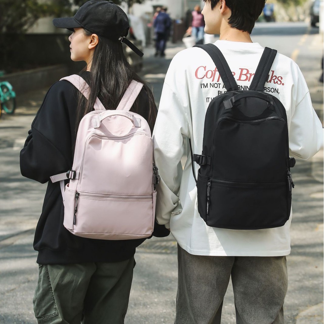 The 2025 new schoolbag for junior and senior high school students is a simple solid-color backpack with a high appearance level. It is versatile, lightweight and casual travel backpack details Picture