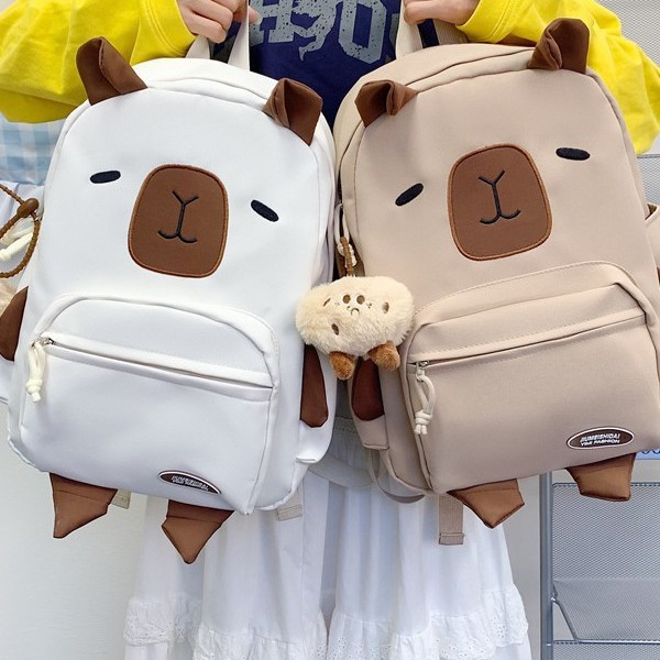 The new high-appearing-level cute Capibara backpack is a versatile large-capacity backpack for high school and junior high school students' commutes full figure