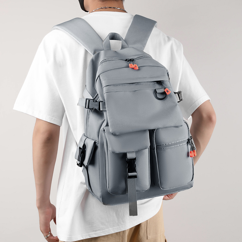 New large-capacity multi-compartment casual, versatile and simple backpack, solid color waterproof and fashionable schoolbag for junior and senior high school students full figure
