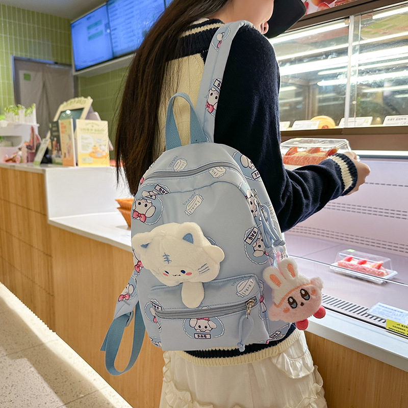 Cute cartoon schoolbags for children's kindergartens, small backpacks for girls, large-capacity portable backpacks for parent-child outdoor travel details Picture