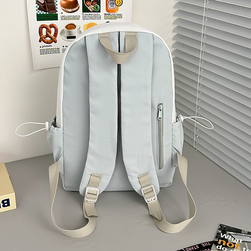 Korean macarons are cute and versatile. Junior high school schoolbag, girl's stylish color-blocking backpack, high appearance level high school student backpack Specification drawing