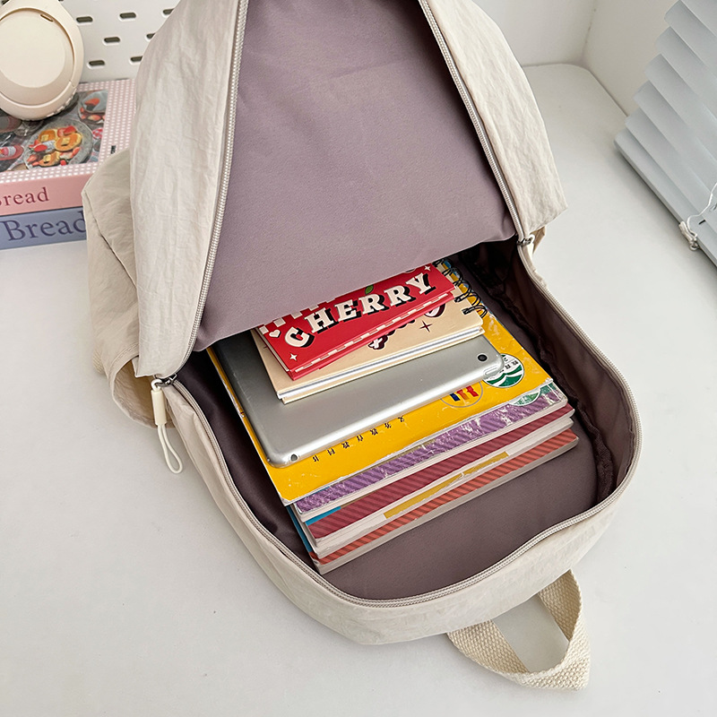 A new Korean-style Instagram backpack with a high level of appearance, fresh and sweet macaron color, is simple, lightweight and has a large capacity for women Application Scenario