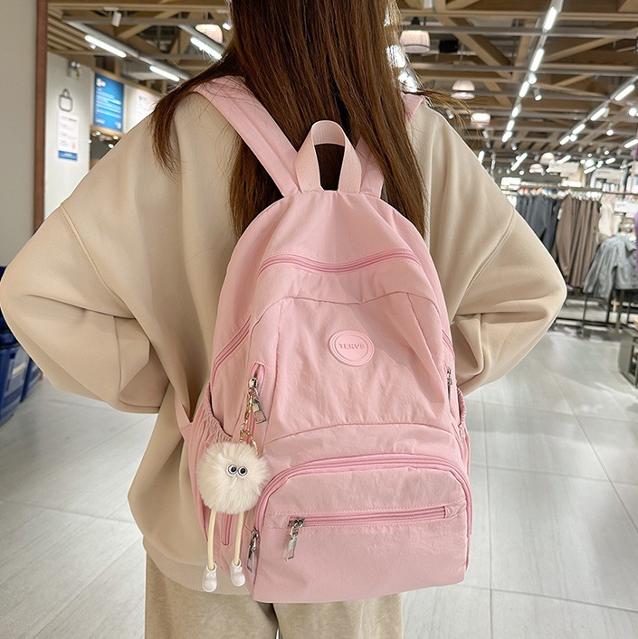 The ins backpack is a niche design backpack for female college students with a simple and solid color. It is a Korean-style travel backpack for junior and senior high school students full figure