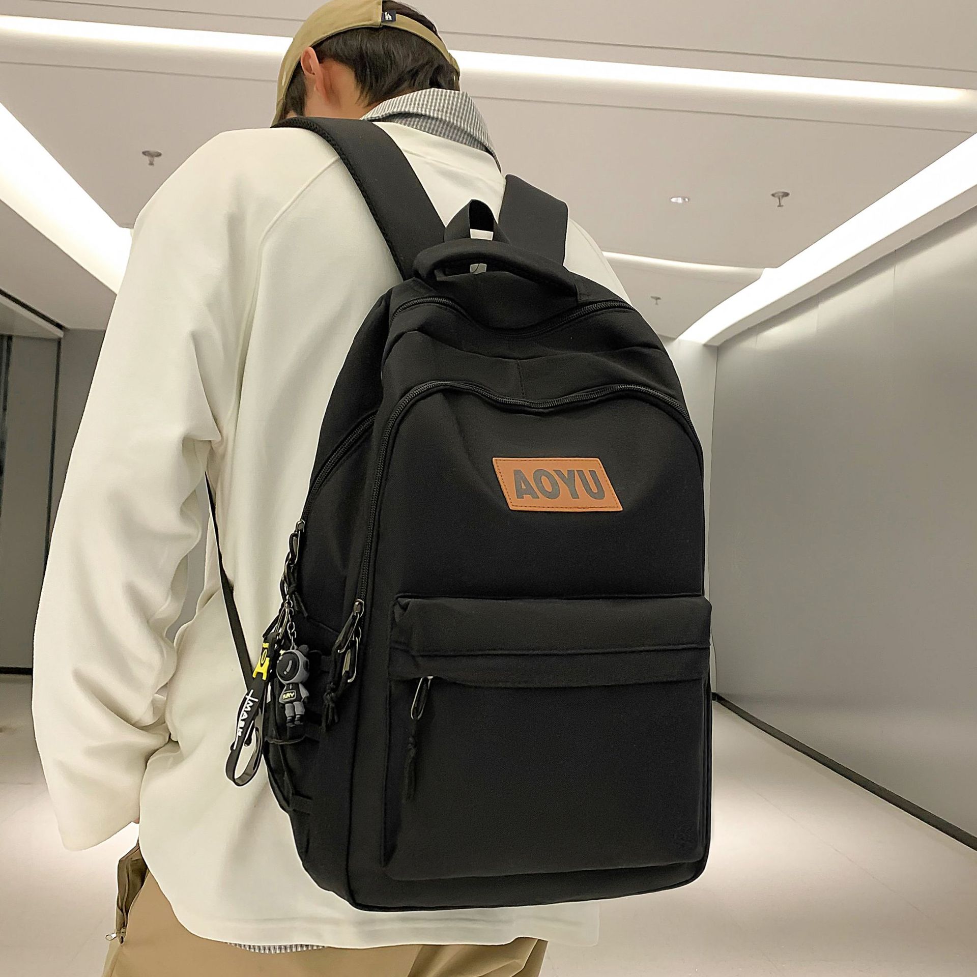 New large-capacity, simple and trendy college student couple computer bag, sturdy and durable middle school student backpack full figure