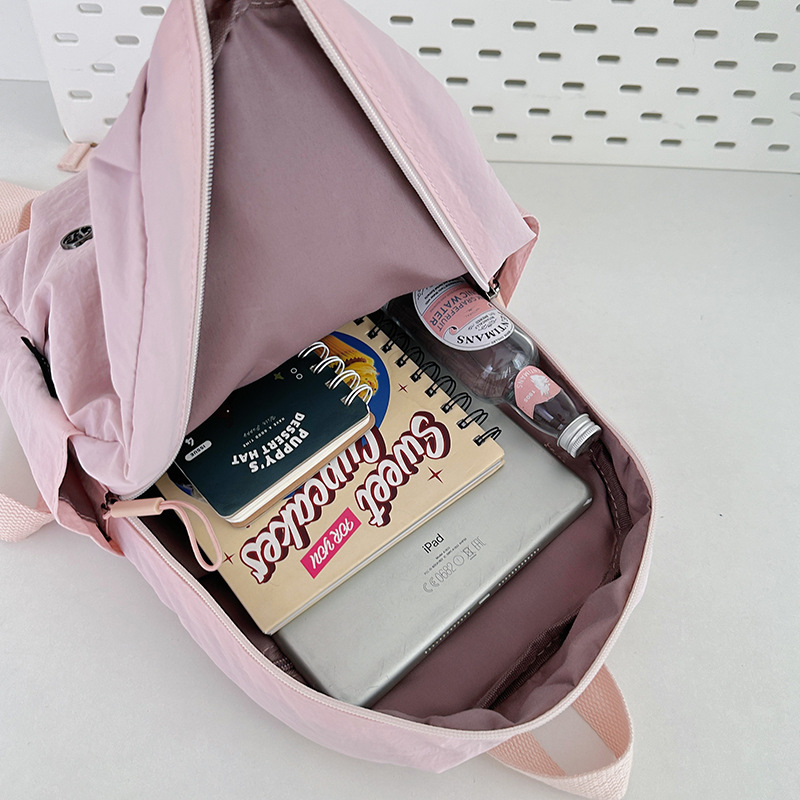 A new high-appearance-level, fresh candy-colored mini backpack from Korean Instagram, a lightweight travel backpack for junior and senior high school girls Application Scenario