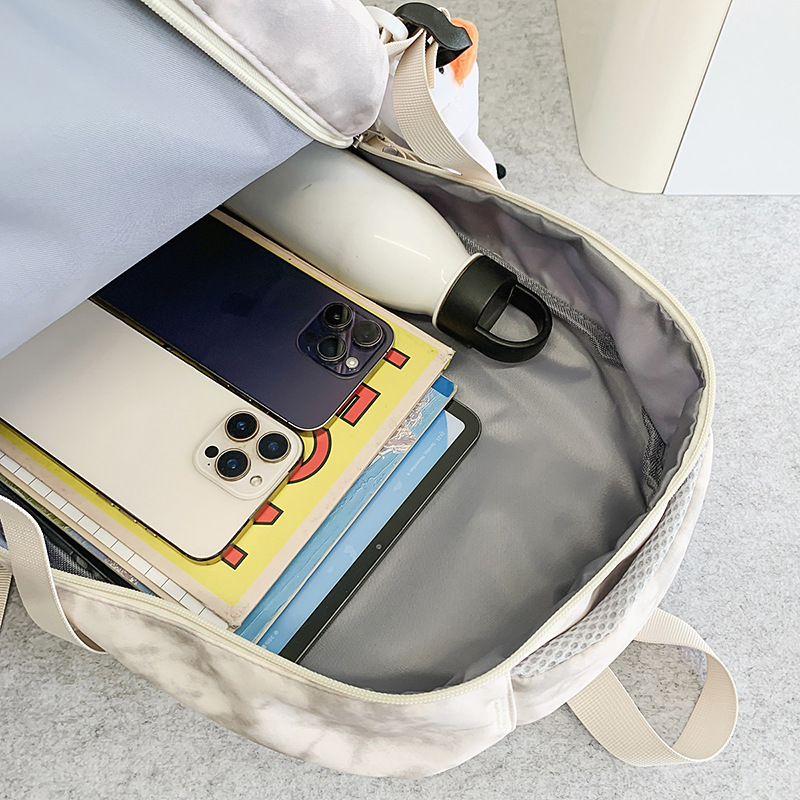 New college-style letter-themed lightweight backpack for junior and senior high school students, large-capacity travel backpack for girls Application Scenario