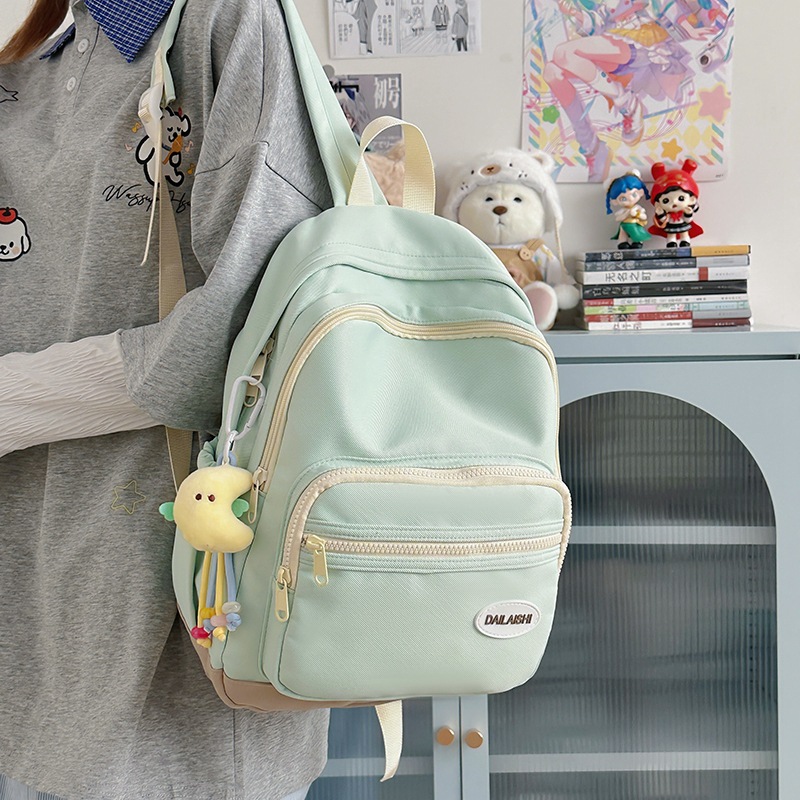 A new high-appearance-level Korean candy-colored fresh and sweet backpack, a lightweight and large-capacity backpack for junior and senior high school students to take extra classes full figure