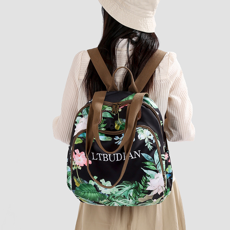 A new high-appeal, fresh and sweet floral print mini backpack for women, a multi-purpose, lightweight backpack for shopping and traveling details Picture