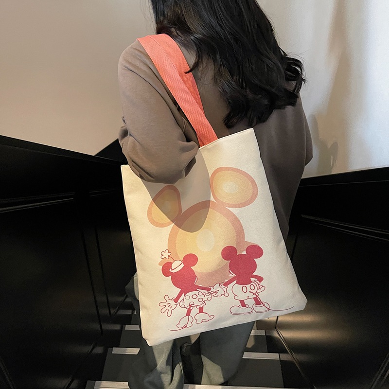 2025 New canvas handbag, casual cartoon, business commuting single-shoulder bag, travel tote bag, simple mommy bag full figure