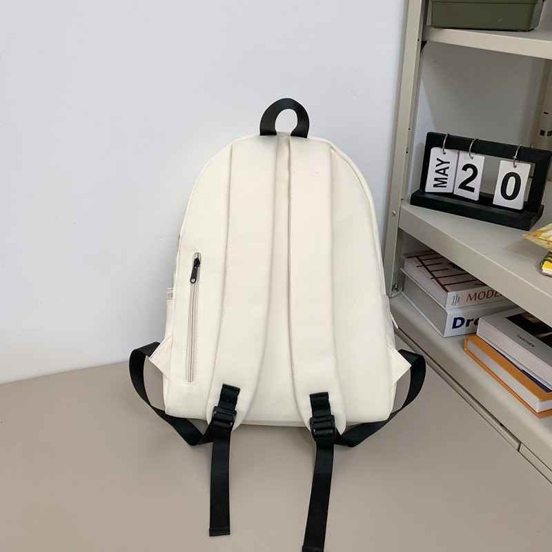 A Japanese-style Instagram niche graffiti schoolbag with high appearance standards, a cute and versatile backpack for junior high school girls, and a lightweight travel backpack Specification drawing