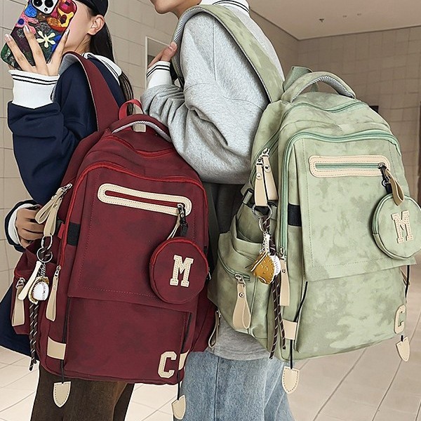 A new high-appearancelevel solid-color letter backpack from Korean Instagram, a couple's casual, simple, lightweight and large-capacity backpack details Picture